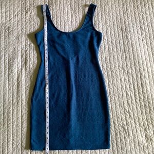 Bodycon Sleeveless Teal Blue mini dress.